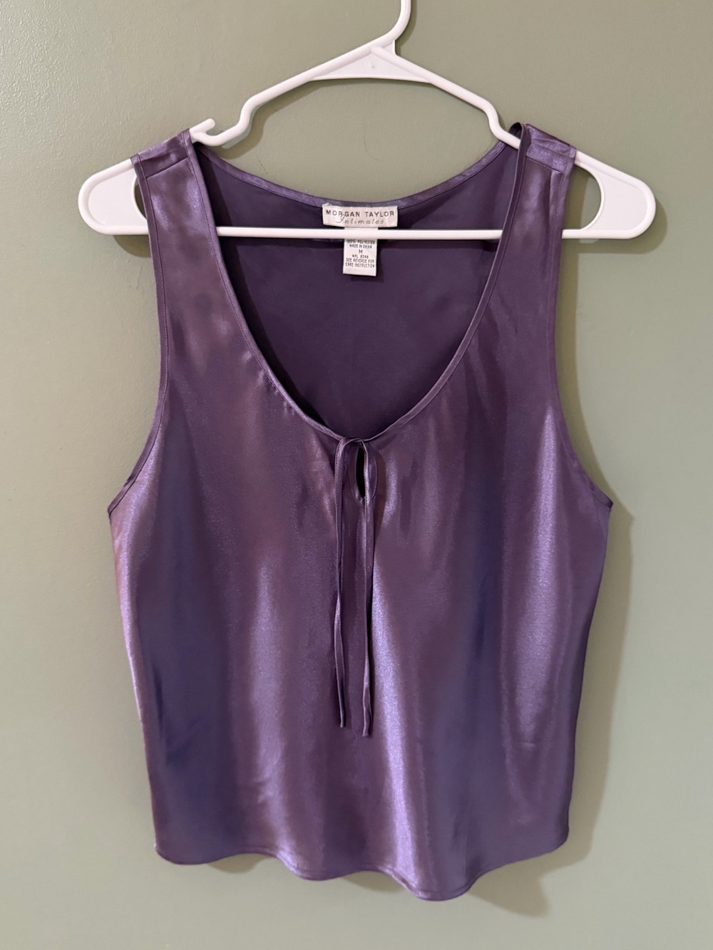 Morgan Taylor intimate top features a purple satin fabric with a V-neck medium